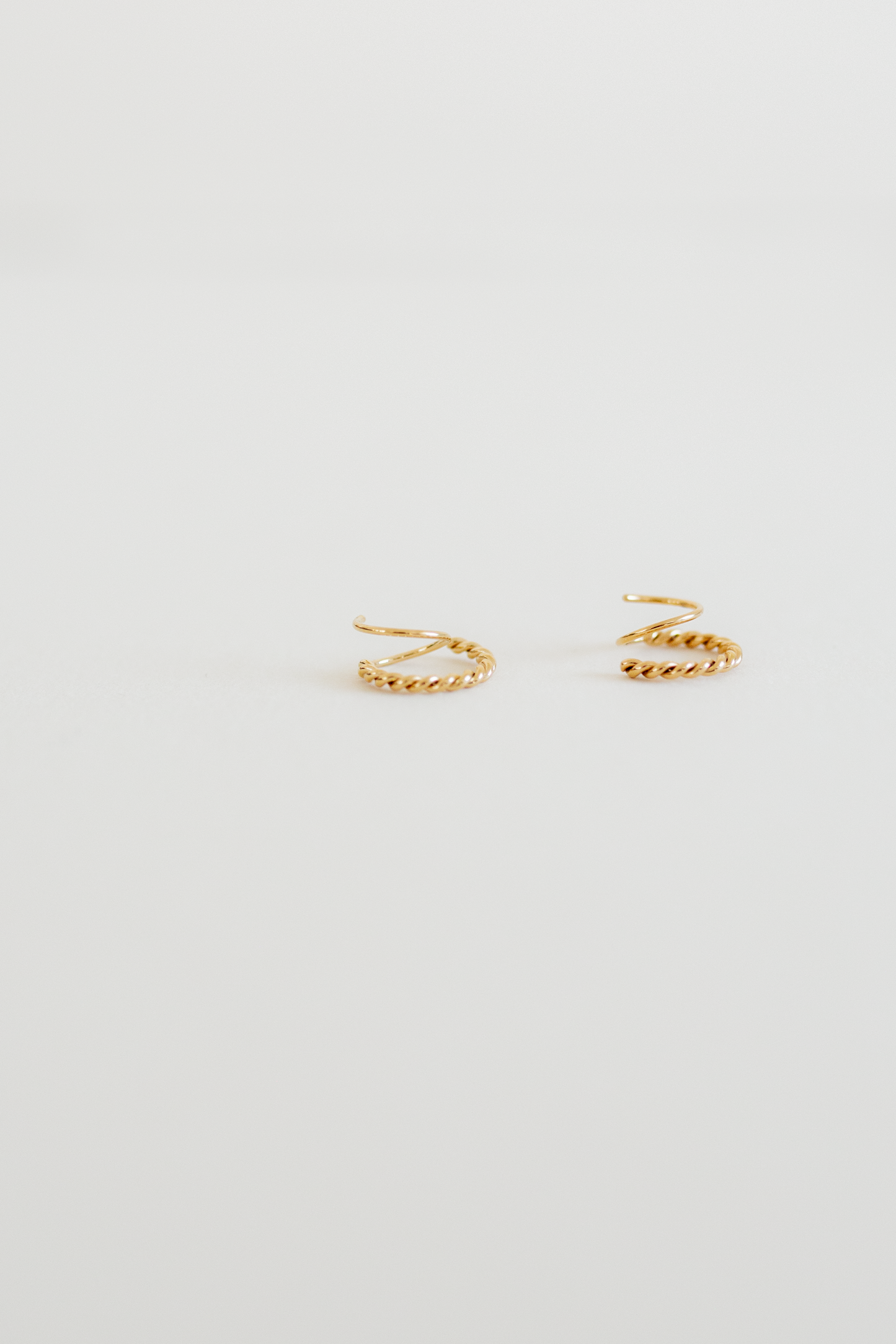 Feenix Gold Twist Huggie Earrings